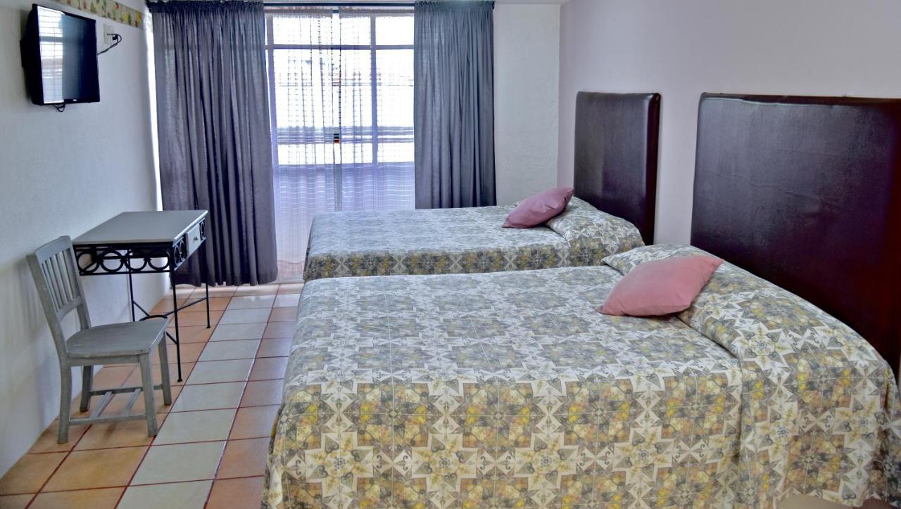 Hotel Posada Centenario อิกซ์มีกิลปัน ภายนอก รูปภาพ